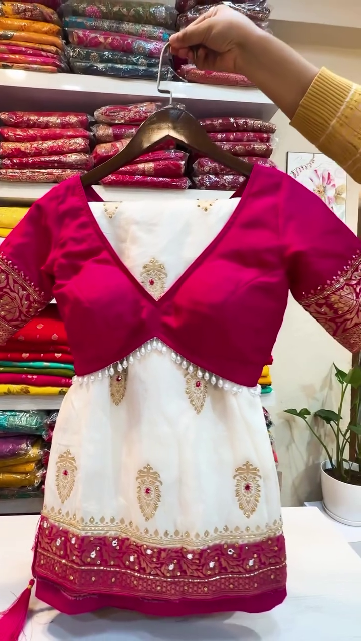 Off-White and Rani Pink Embroidered Lehenga Choli Set